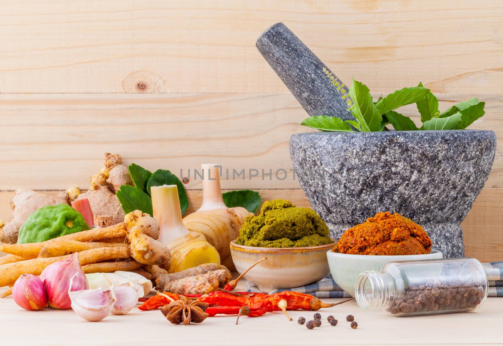 Assortment of Thai food Cooking ingredients and Paste of thai popular food red curry and green curry.