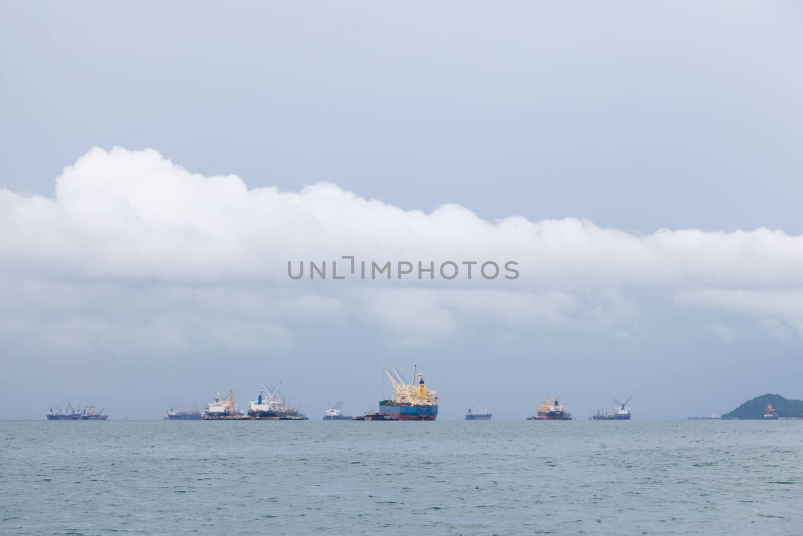Cargo ship. Parking in the sea to await transportation to the port.