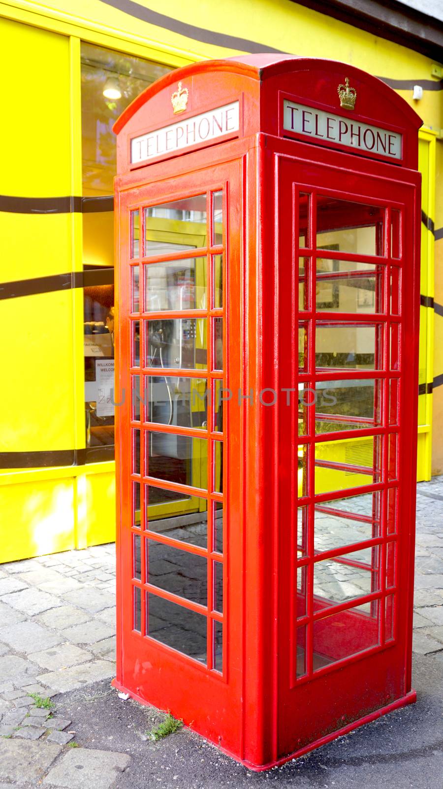 Red telephone booth traditional in Europe