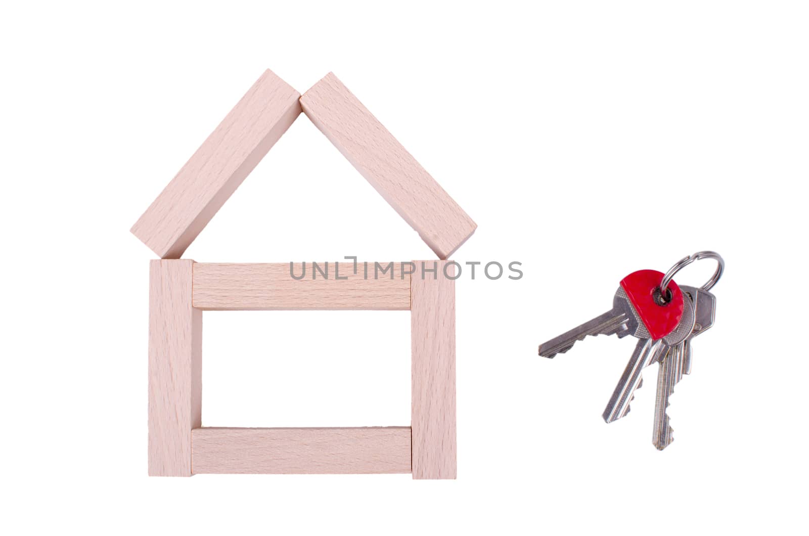 Wooden bricks house and keys with red marker.