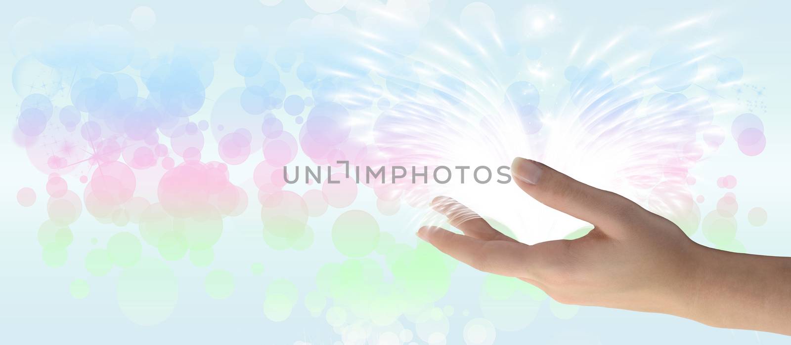 Healing Hand on a sparkling pastel coloured background