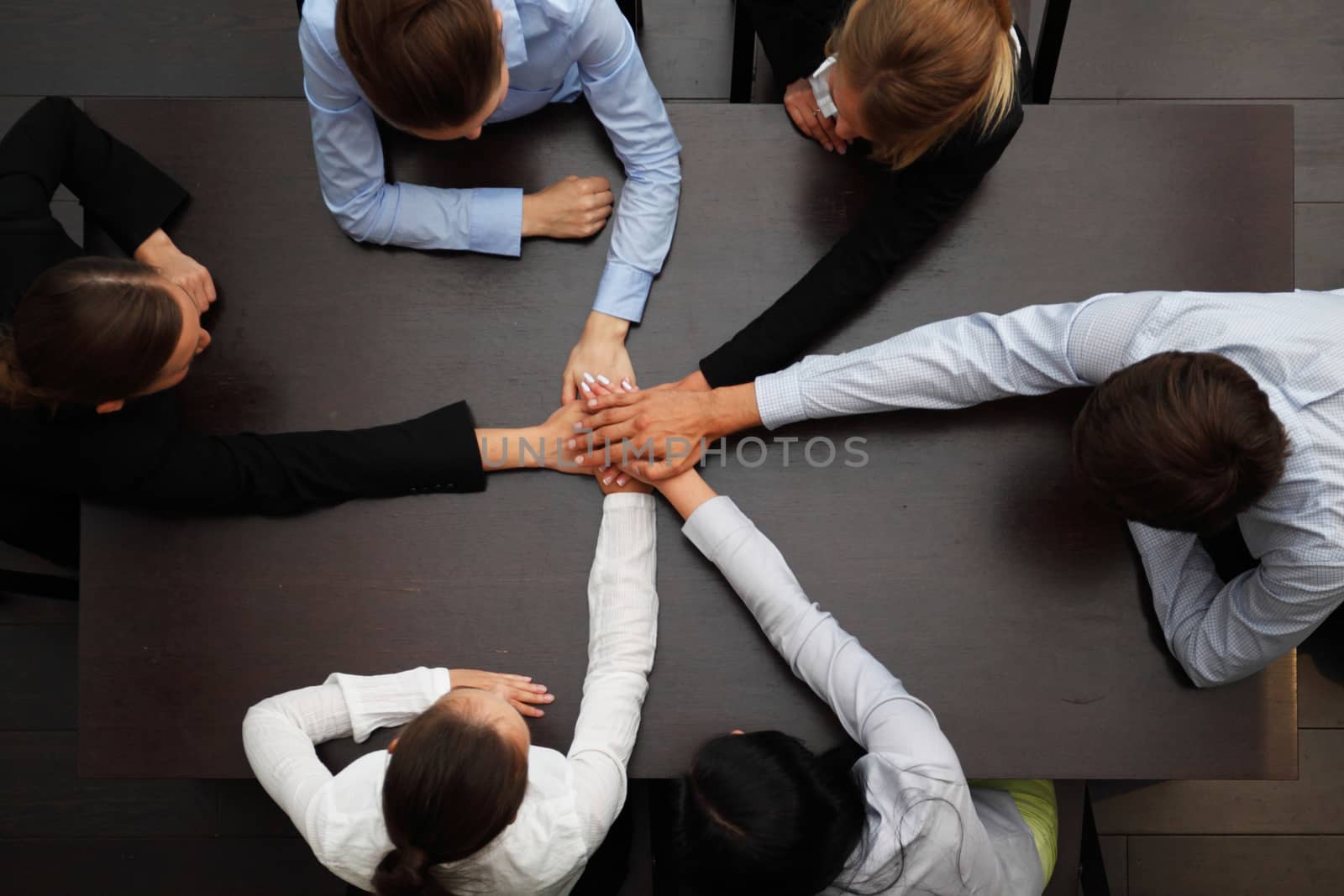 business people holding hands concept