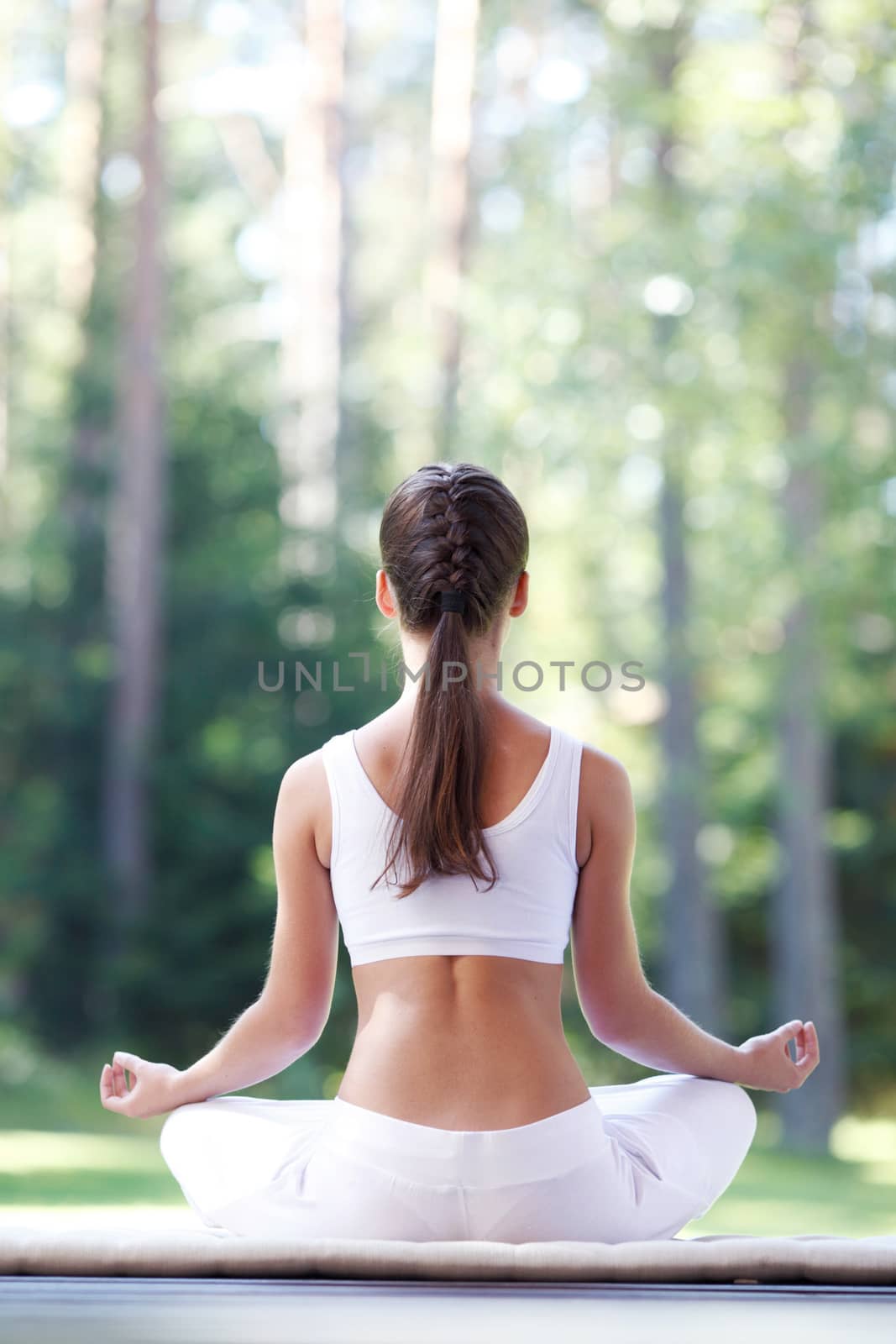 yoga woman in park by ALotOfPeople