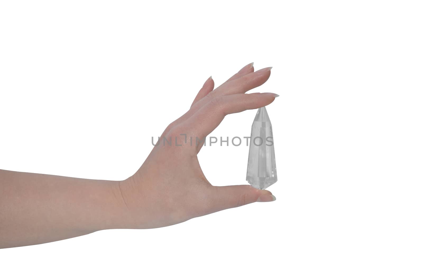 Woman's hand holding Vogel wand-Crystal healing tool by stellar