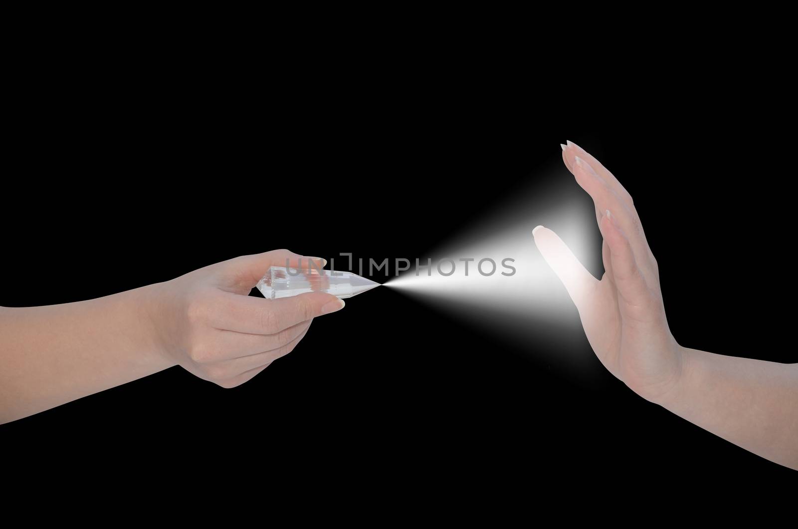 Woman's hand demonstrating  Vogel wand healing energy