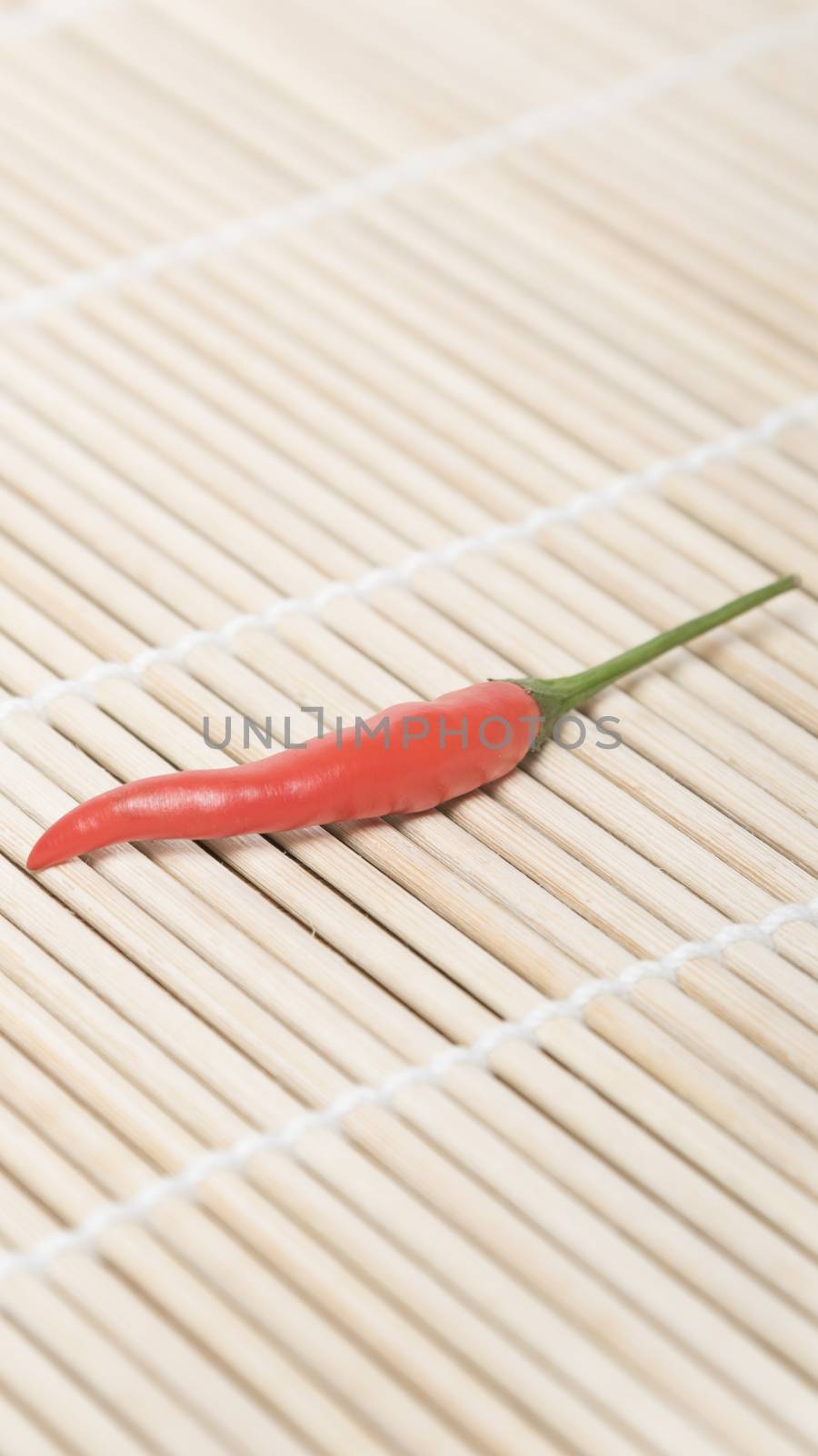 red chili peppers on mat