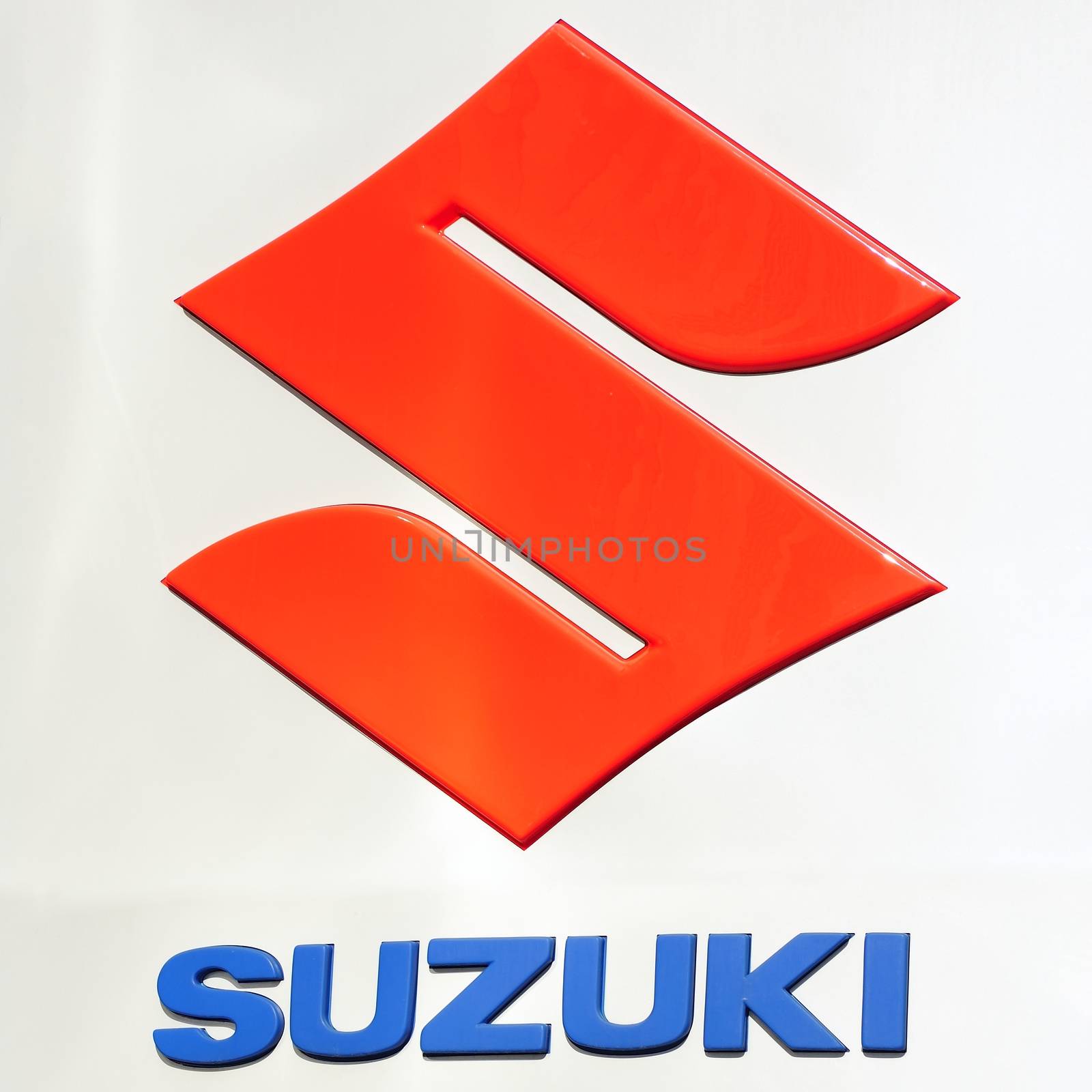STOCKHOLM - MAY 1 2013: Suzuki logo sign on showroom premises photographed on may 1th 2013 in Stockholm, Sweden.