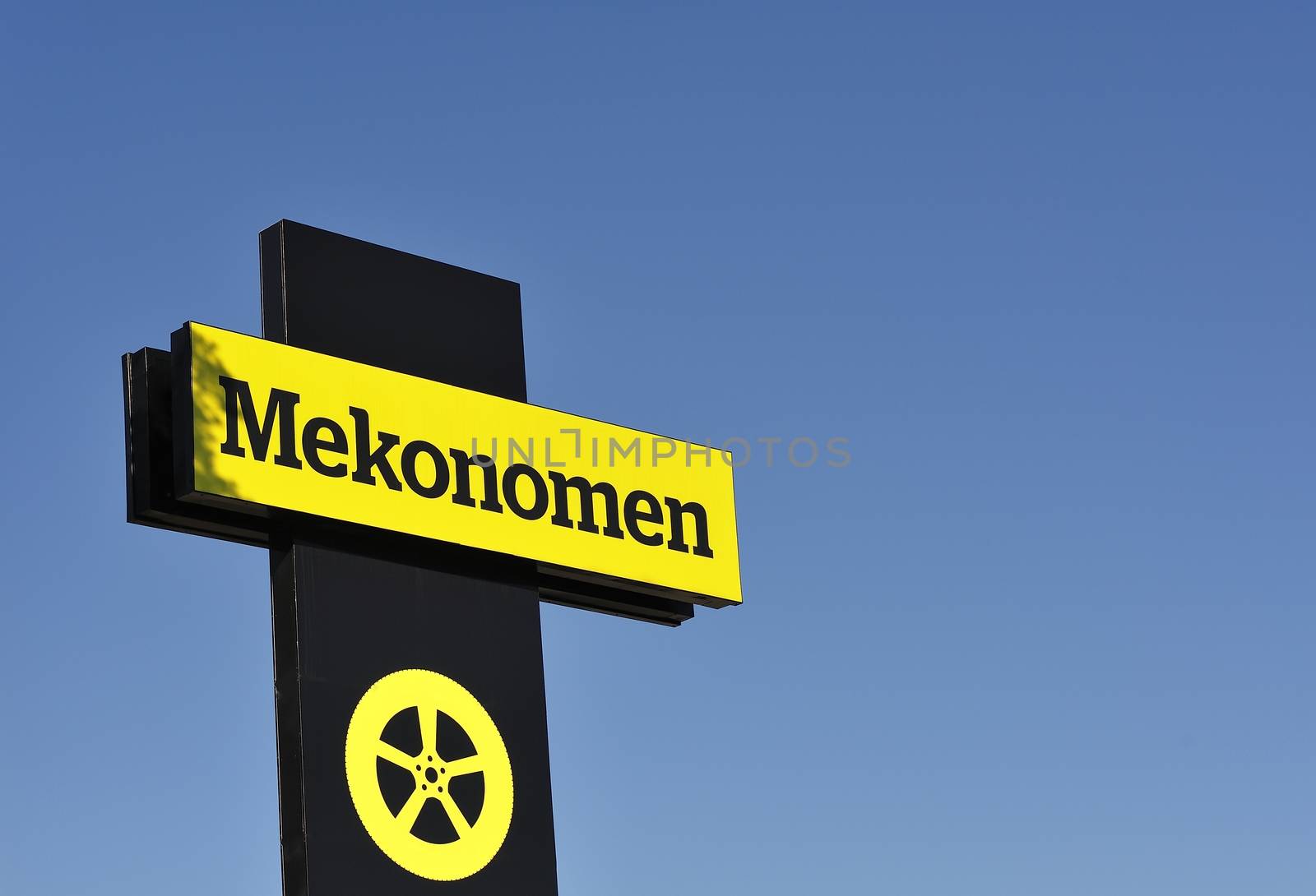 STOCKHOLM - MAY 1 2013: Mekonomen logo sign on showroom premises photographed on may 1th 2013 in Stockholm, Sweden.