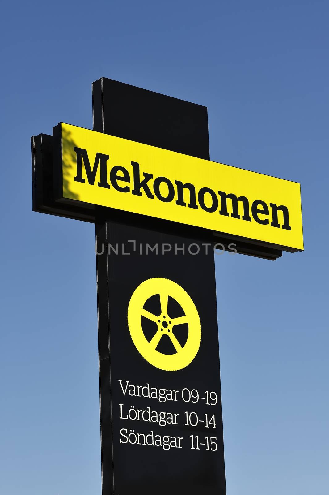 STOCKHOLM - MAY 1 2013: Mekonomen logo sign on showroom premises photographed on may 1th 2013 in Stockholm, Sweden.