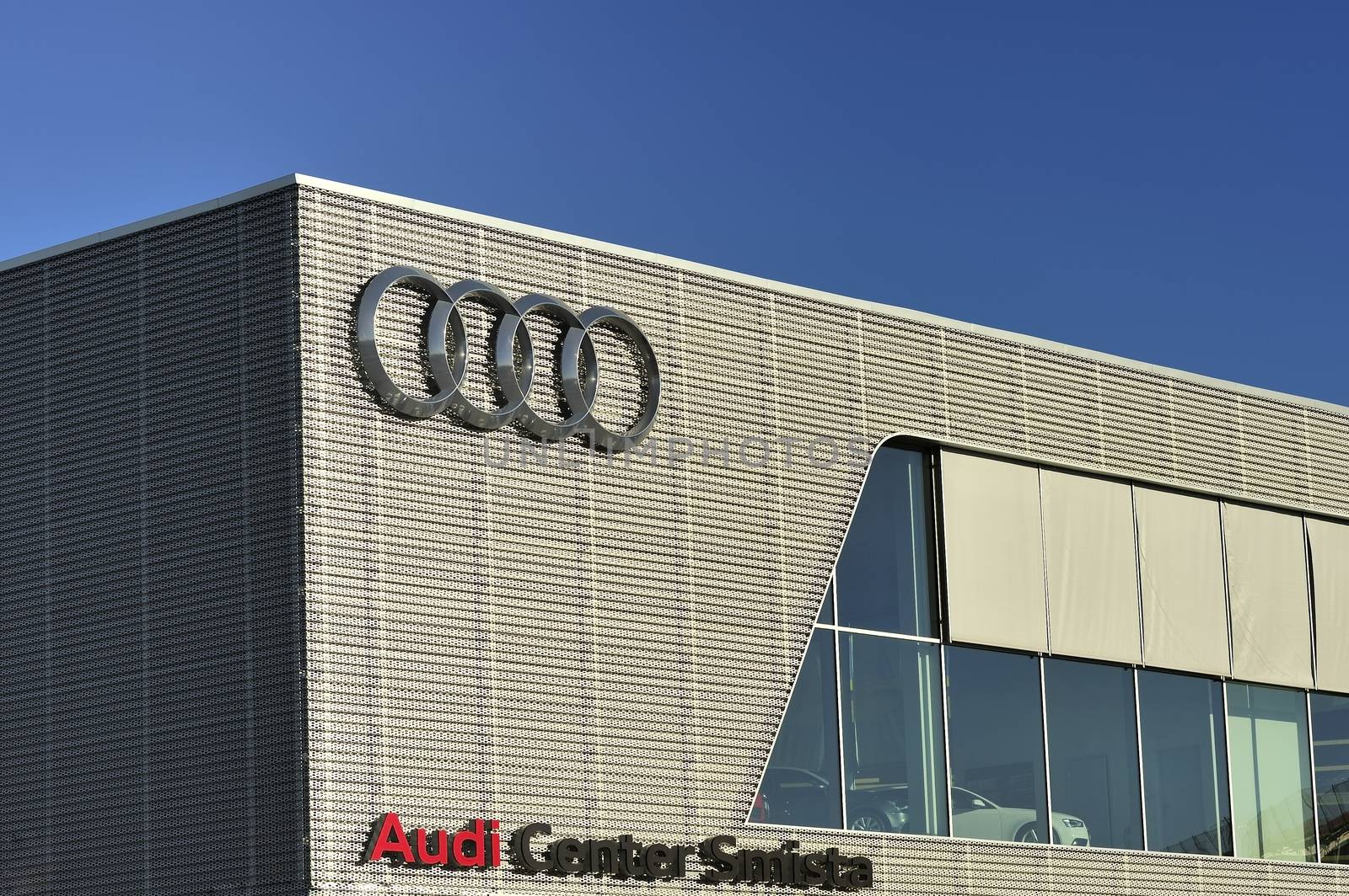 STOCKHOLM - MAY 1 2013: Audi logo sign on showroom premises photographed on may 1th 2013 in Stockholm, Sweden.