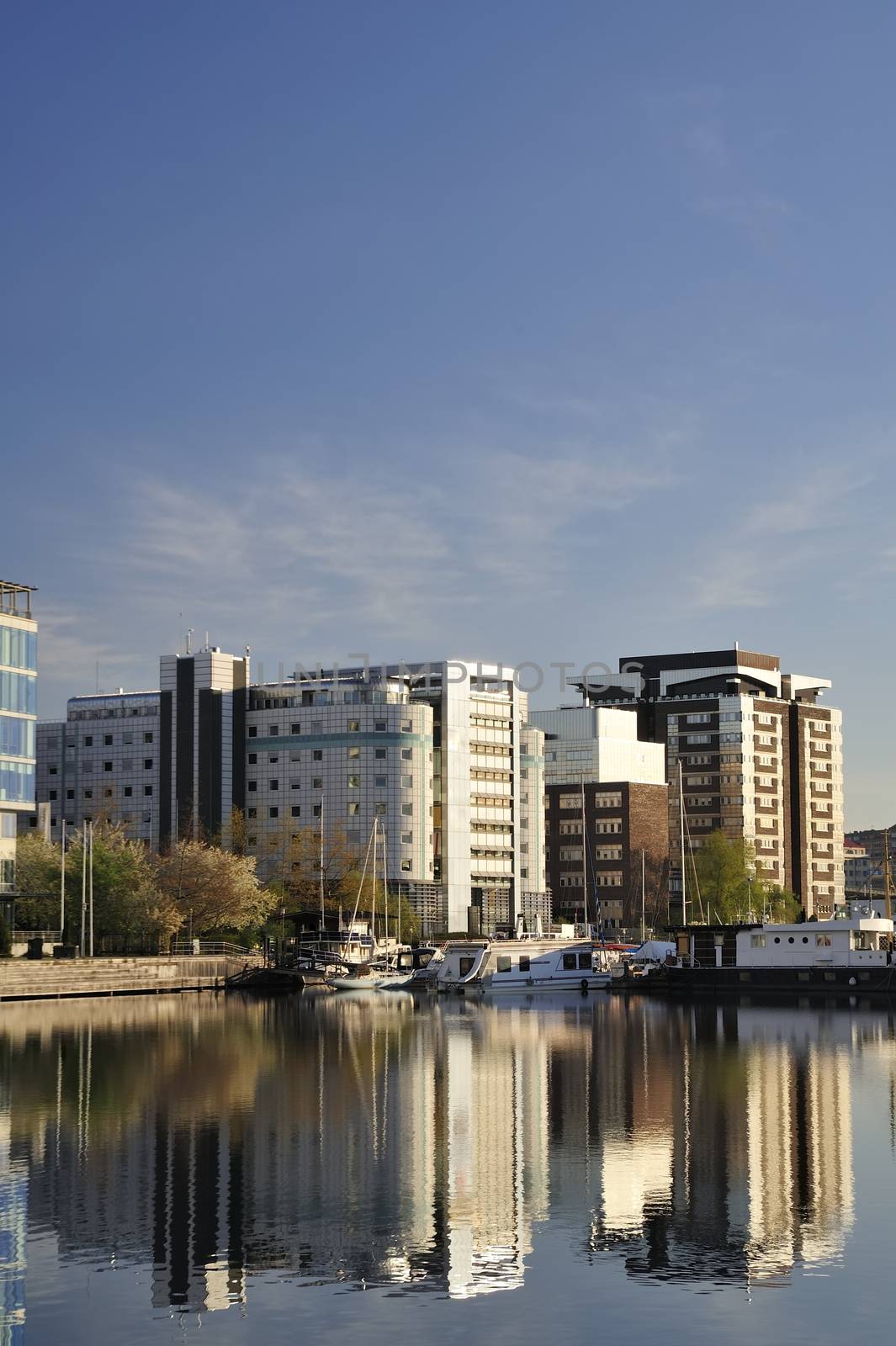 Modern apartment buildings by a40757