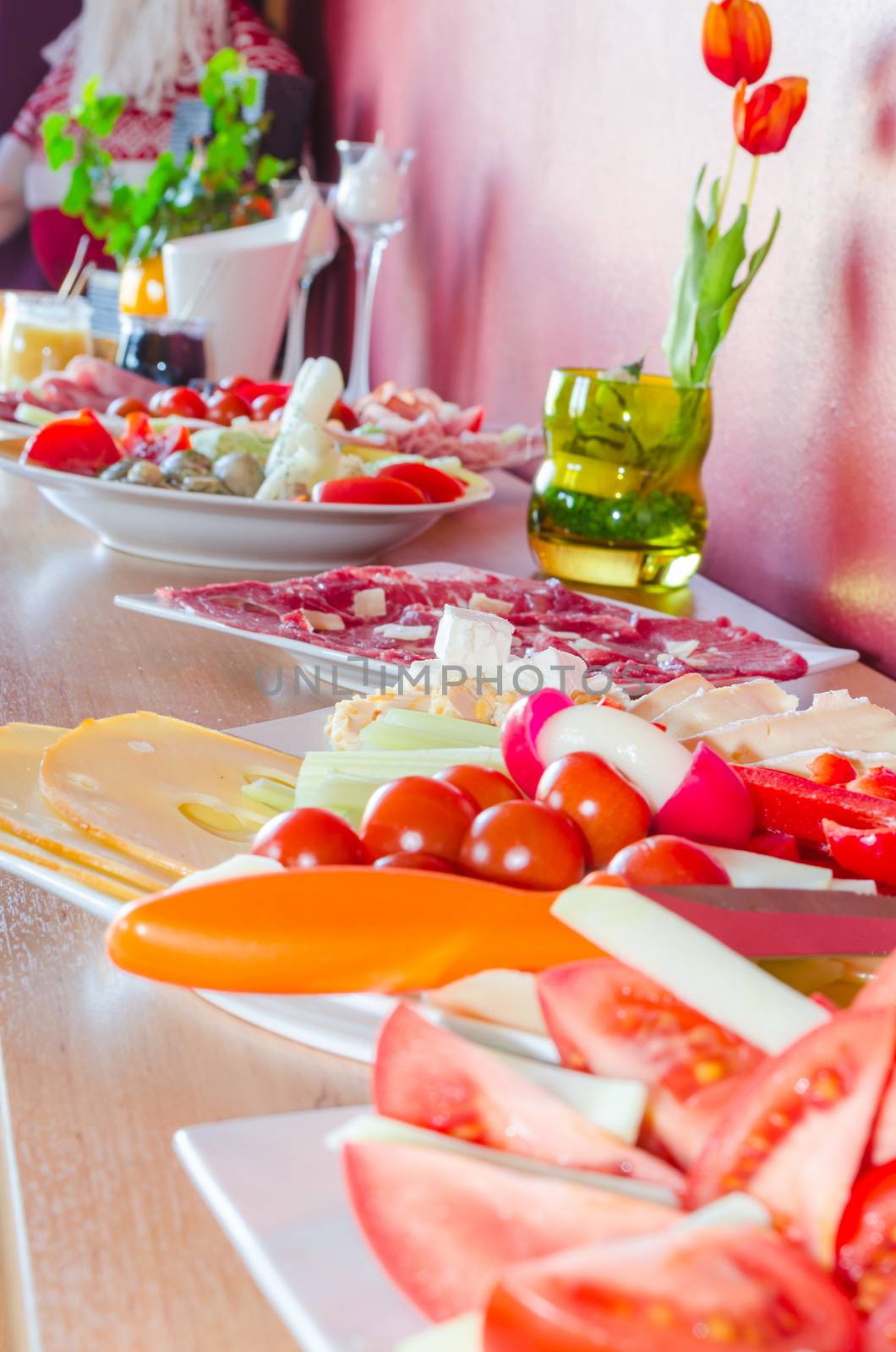 Catering, Buffet for a private party with salads and finger food on a cabinet.