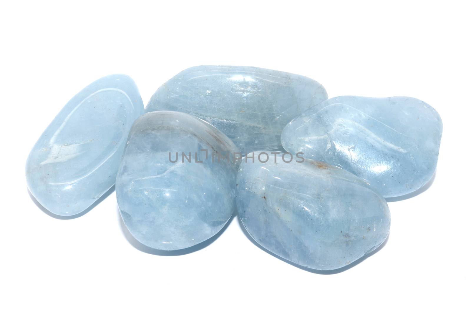 Set of a beautiful tumbled Aquamarine semiprecious stones isolated on white