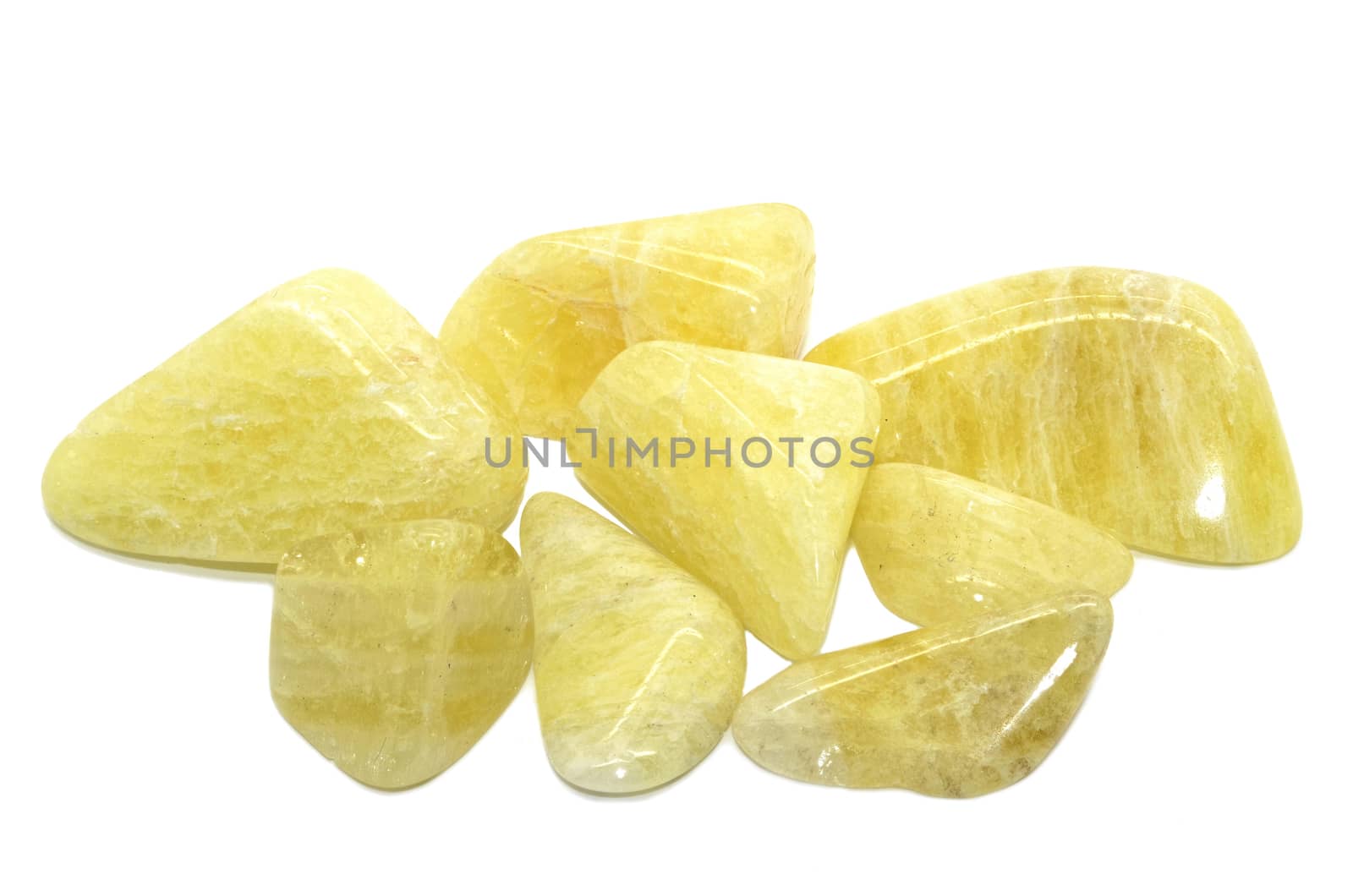 Set of a beautiful tumbled Sunshine Danburite gemstone specimen isolated on white background