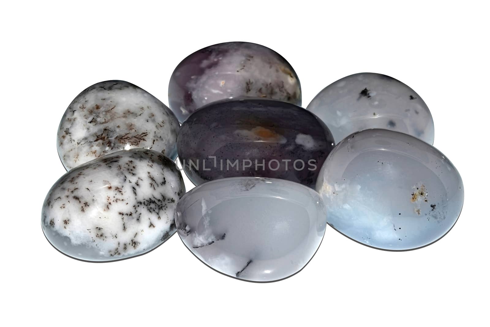 Set of a beautiful Merlinite tumbled stone specimen isolated on white background