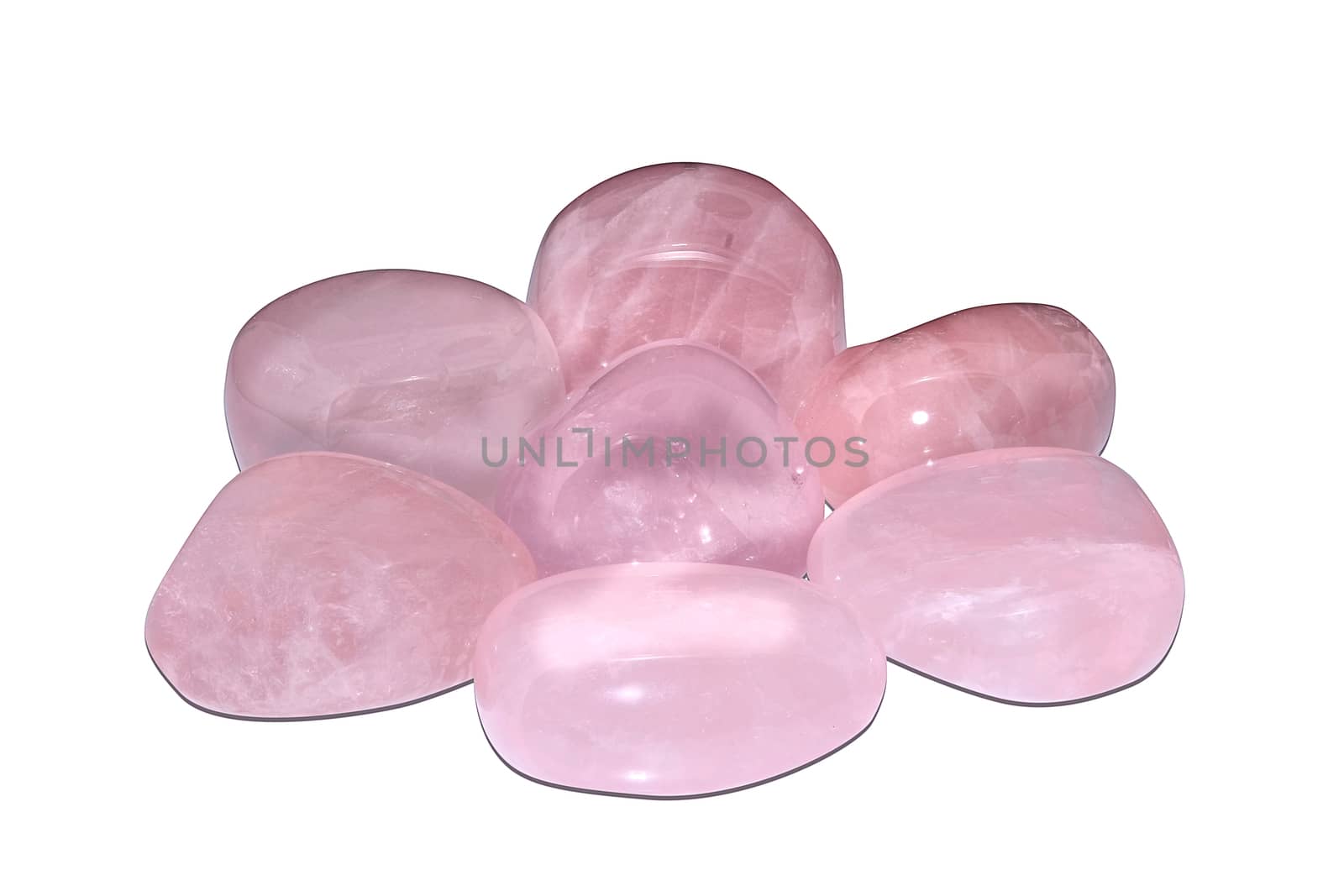 Set of a beautiful Rose Quartz tumbled semiprecious stones isolated on white