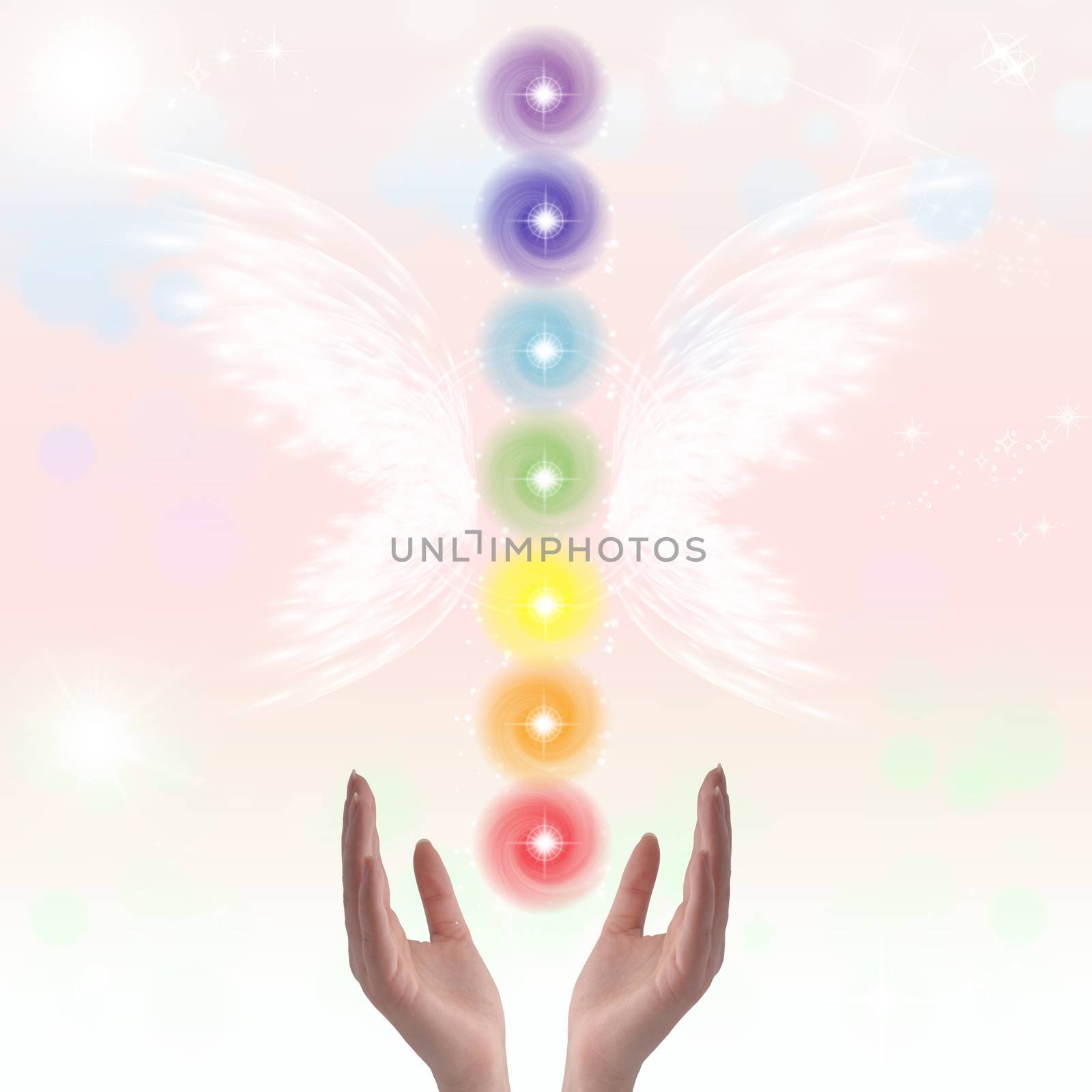 Healing Hands and seven chakras on a sparkling pastel coloured background