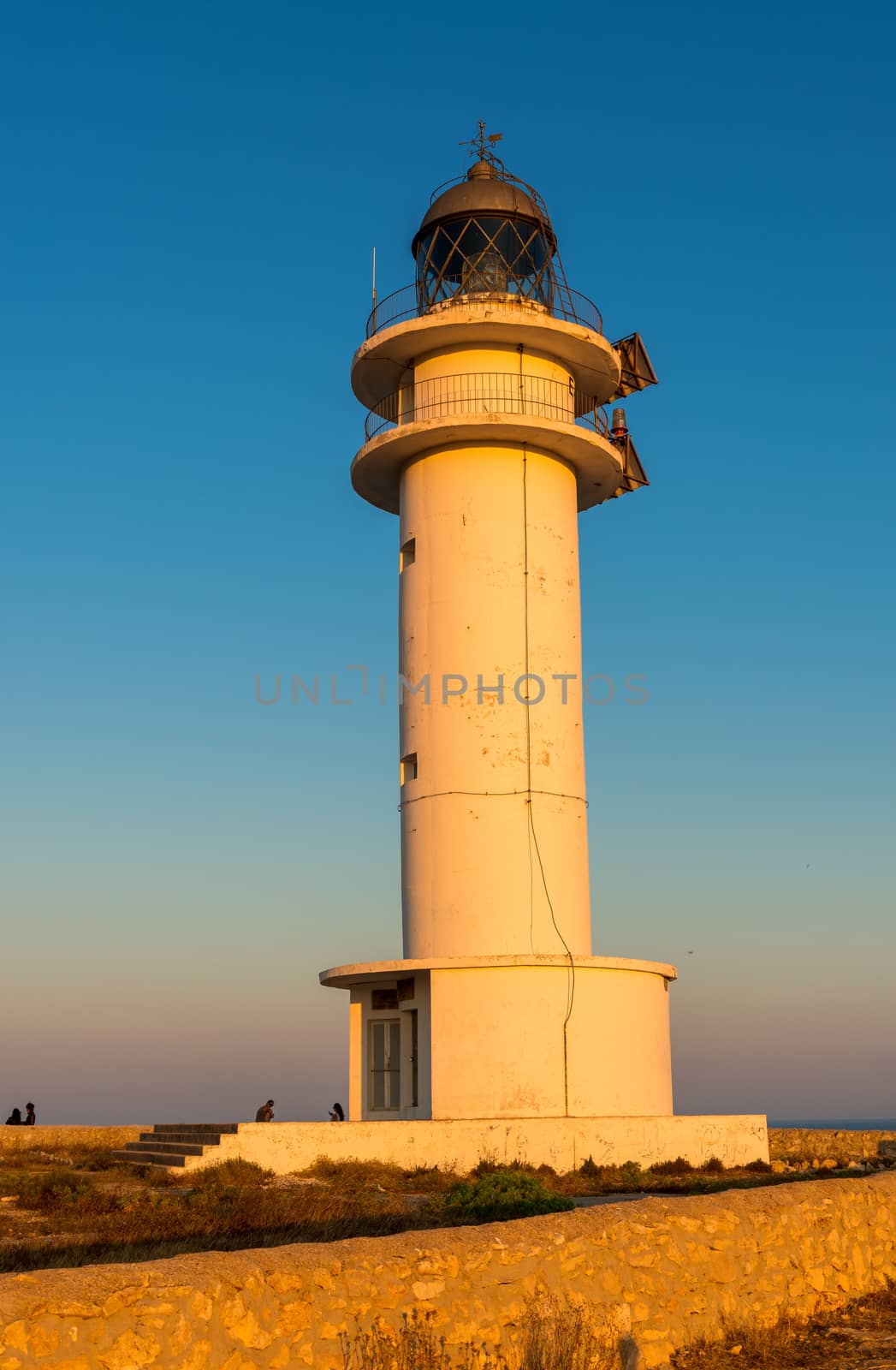 Lighthouse in Formentera at sunset by jovannig