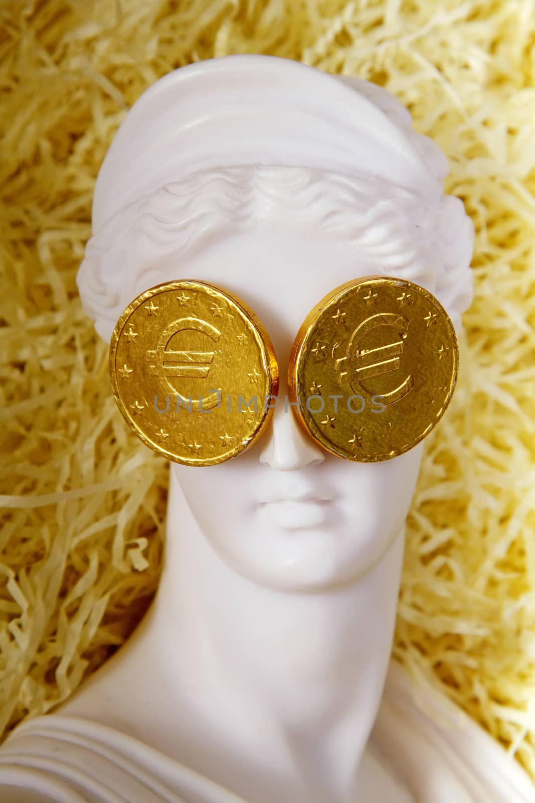  Greek crisis. The Greek goddess Aphrodite with euro coins on the eyes