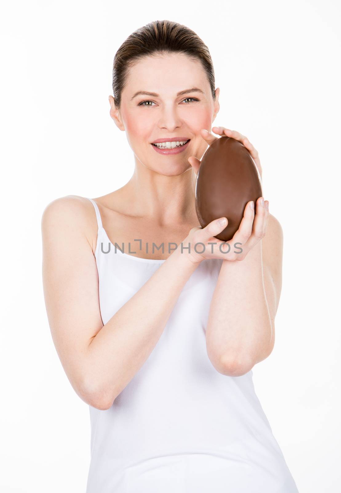 woman holding easter egg by Flareimage