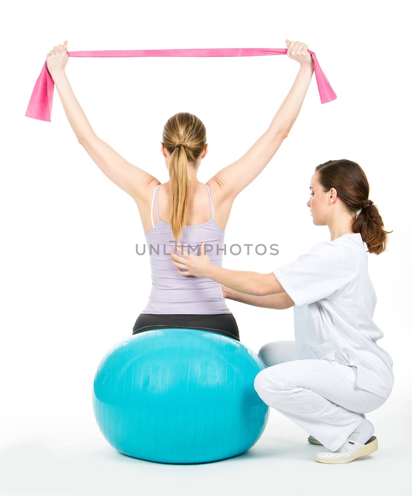 doctor with medical ball and woman patient