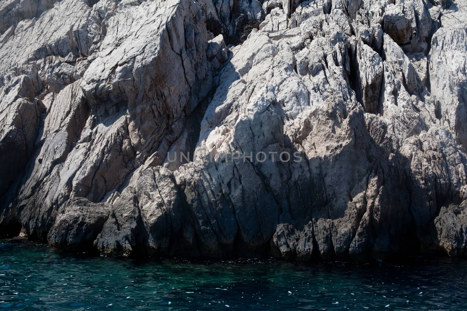 Grey rock and blue sea in Asia Minor
