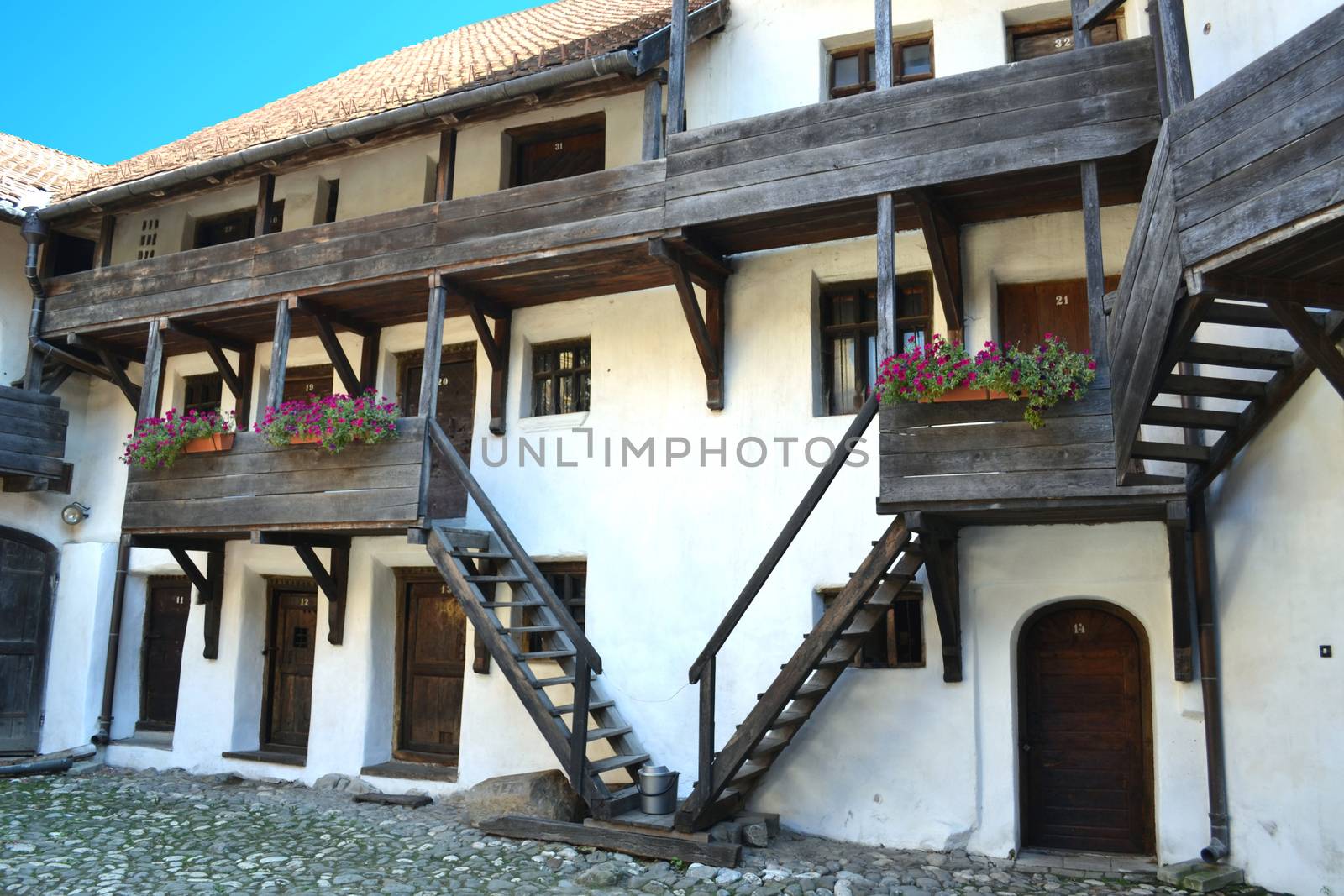 Wooden doors and ramps on a wall inside the Harman church, Transilvania, Romania