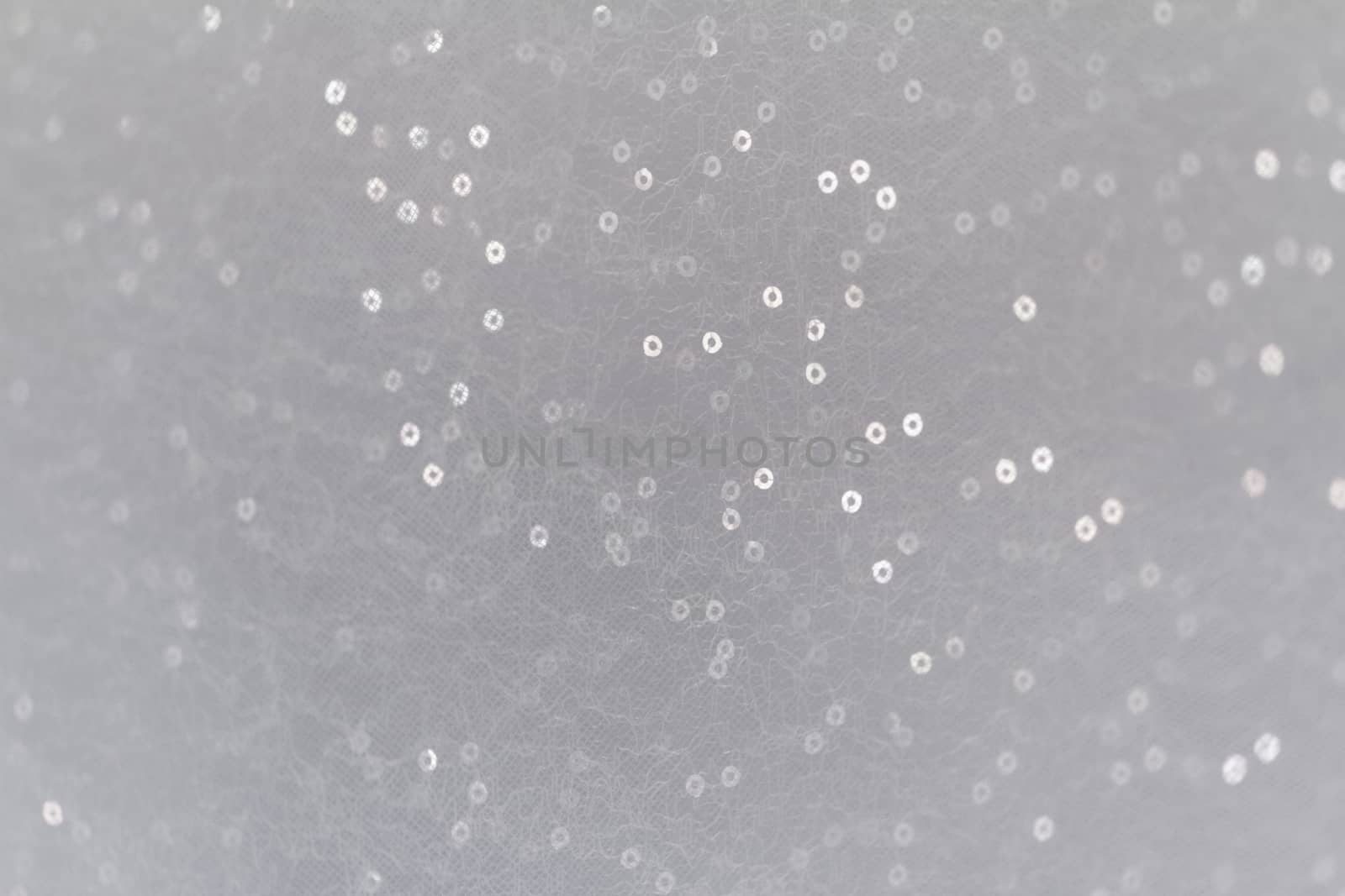 Close up photo of a sequined wedding dress