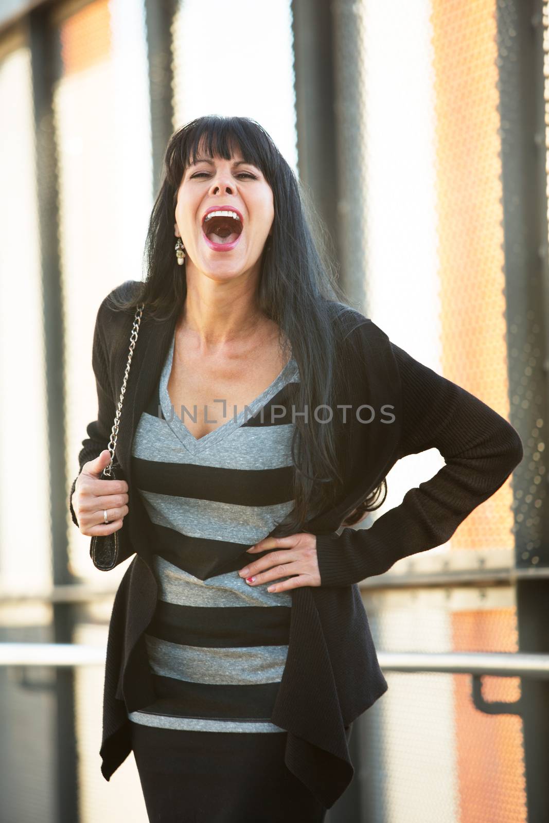 Attractive Woman Laughing by Creatista