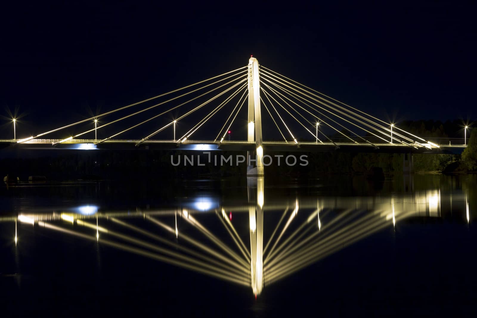 Cable Bridge in Umeå, Sweden. The "Kolbäcksbron" with the river Umeälv in front.