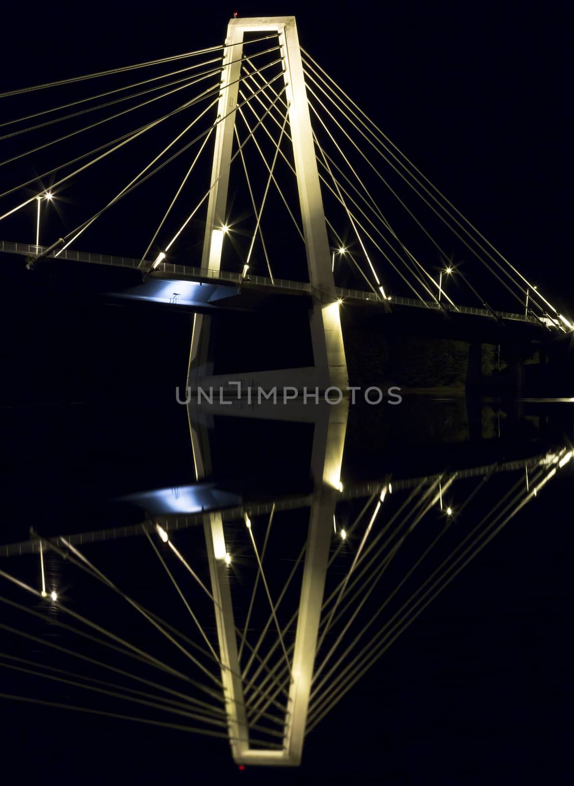 Cable Bridge in Umeå, Sweden. The "Kolbäcksbron" with the river Umeälv in front.