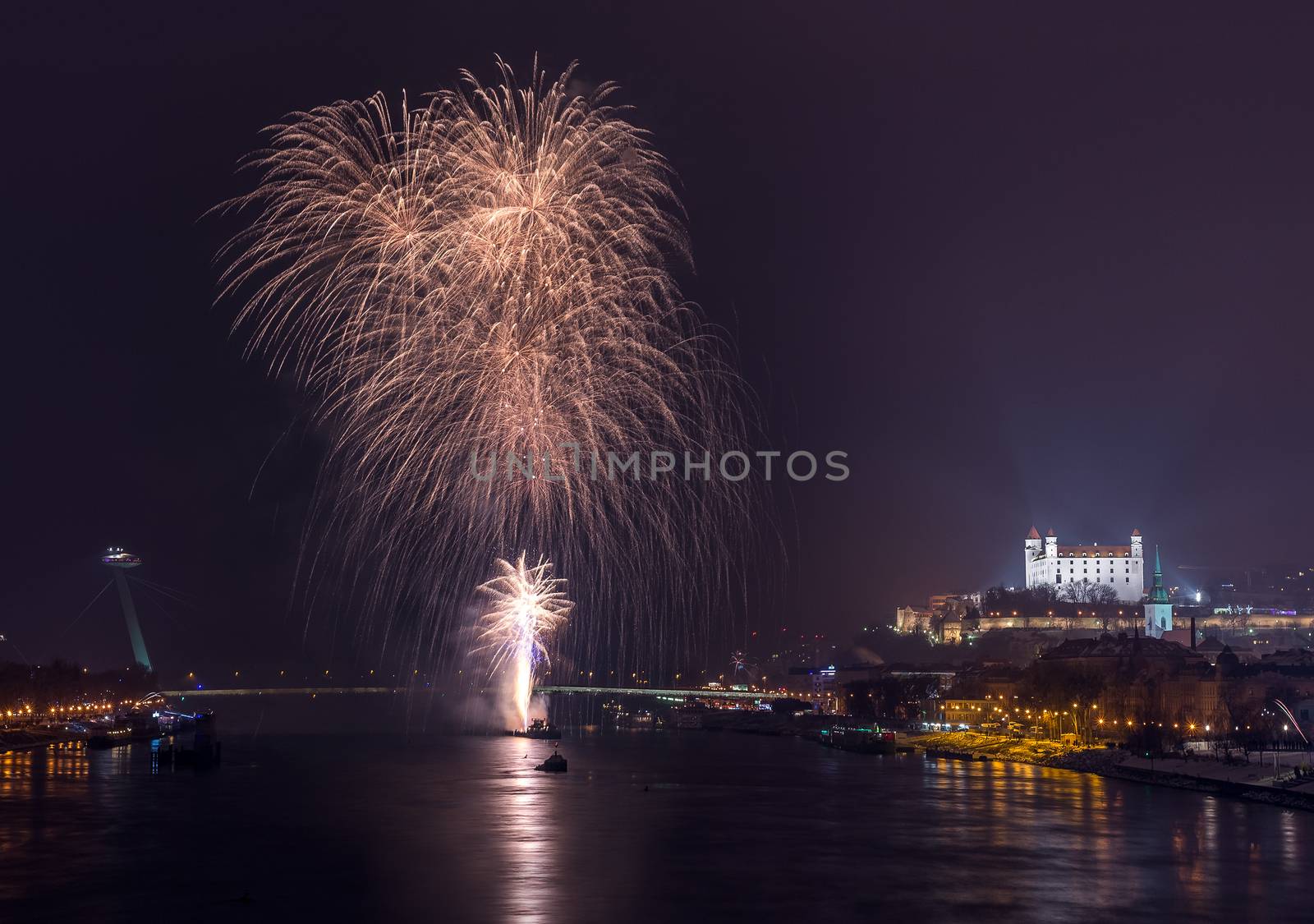 New Year Celebration. Fireworks on the River in Bratislava, Slovakia.
