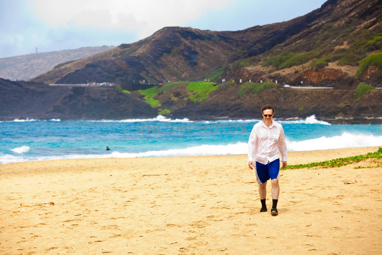 Caucasian man in mid forties on Hawaiian beach by jarenwicklund