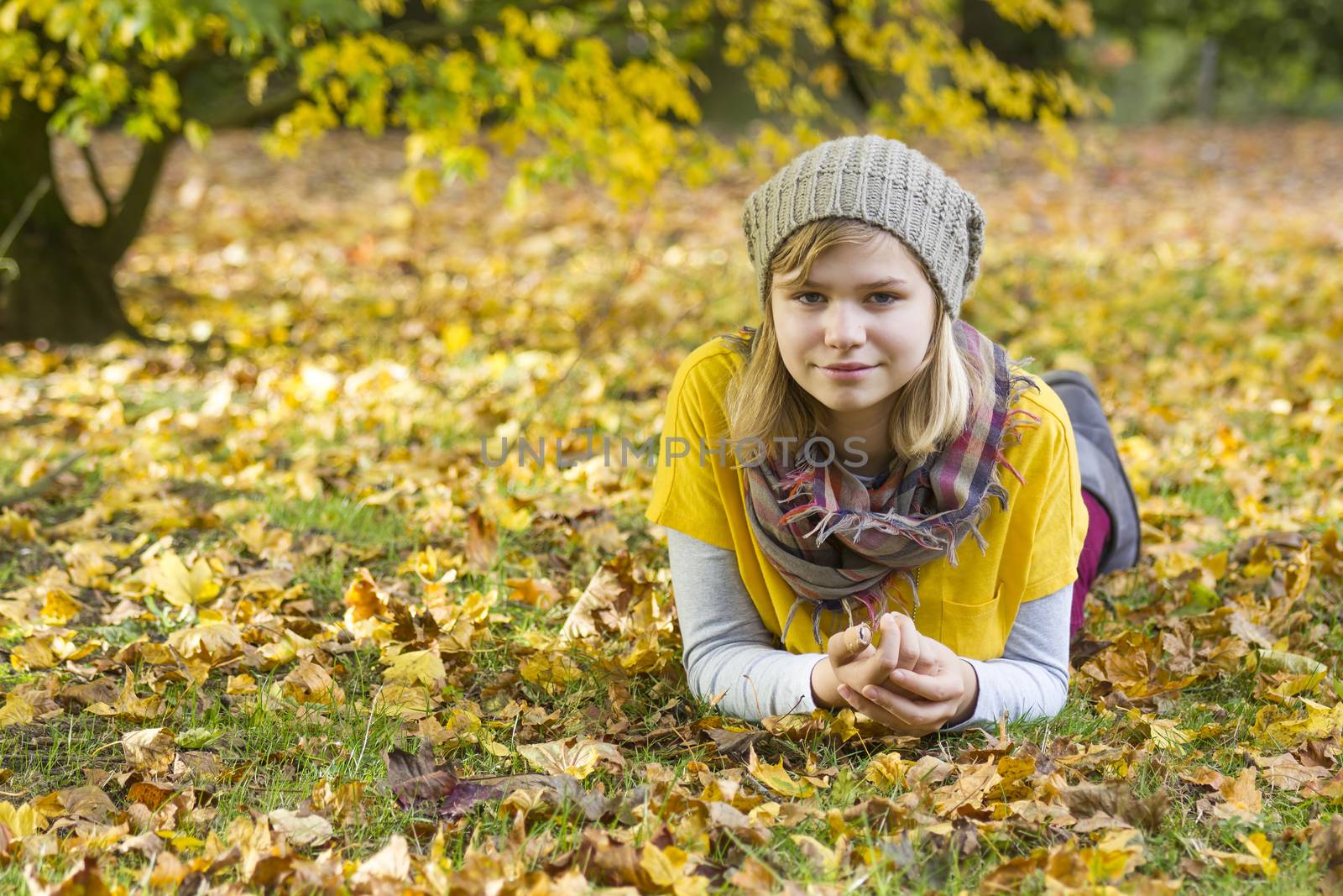 young girl in the autumn park by miradrozdowski