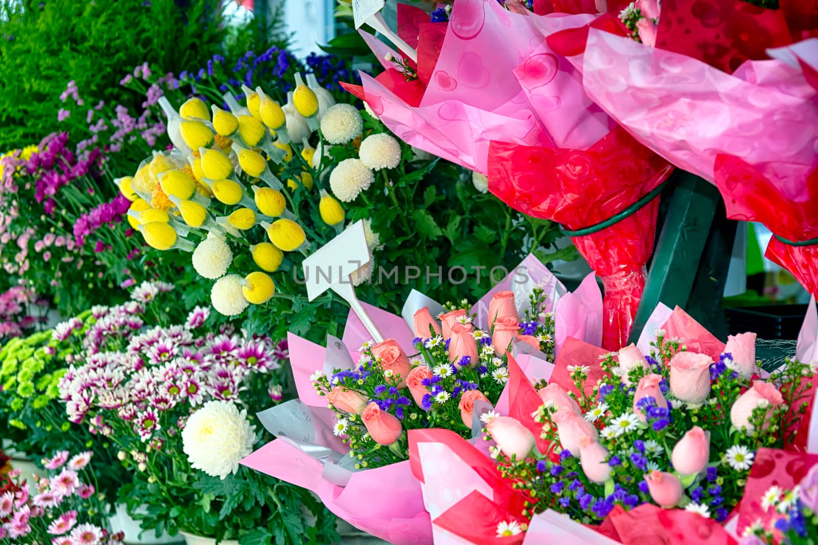 Roses  and other fresh flowers in Kuala Lumpur street market. 