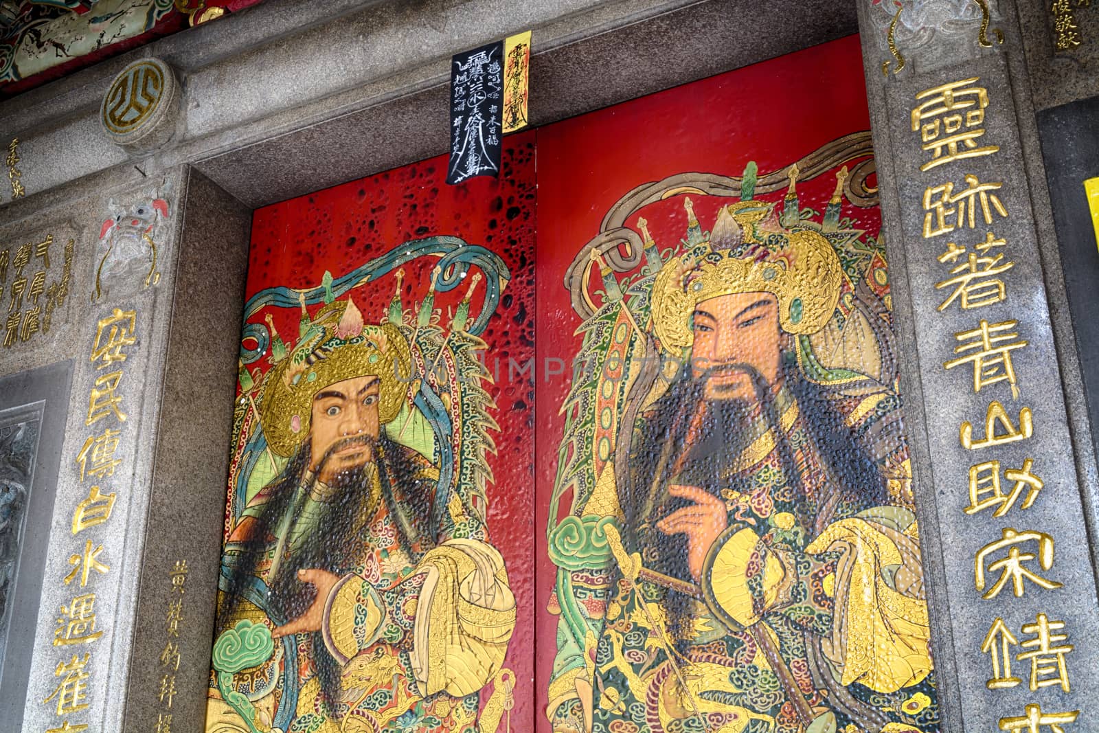 General Hsieh Pi-an and Fan Wu-ti, the two guardians painted on the front door of the Qingshan Temple.