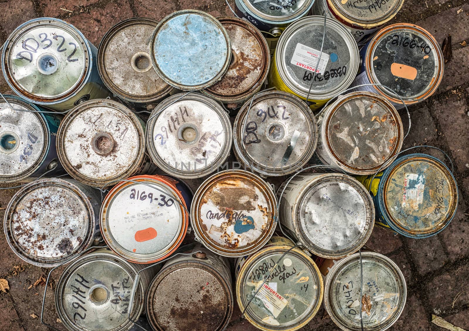 looking down on old paint cans