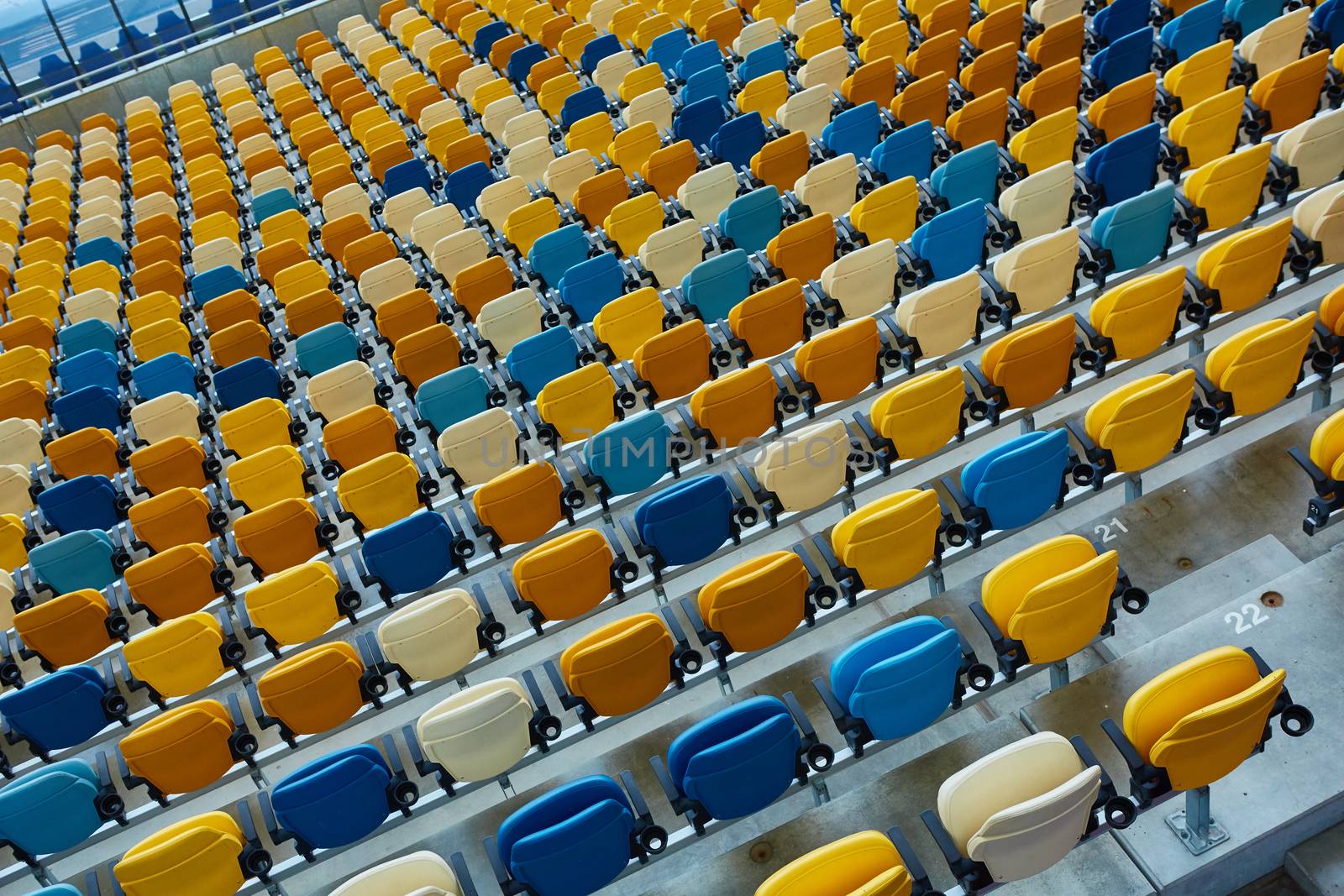 The blue anf yellow empty chair on sport stadium
