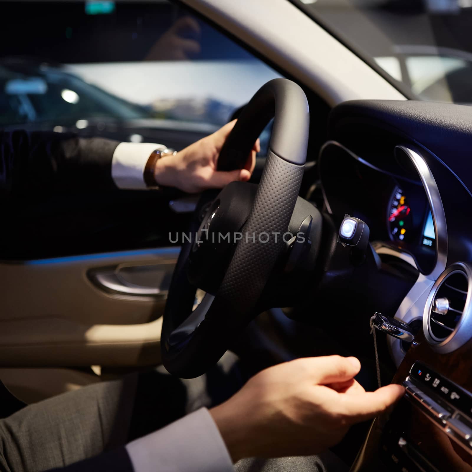 Closeup of hands on a steering wheel