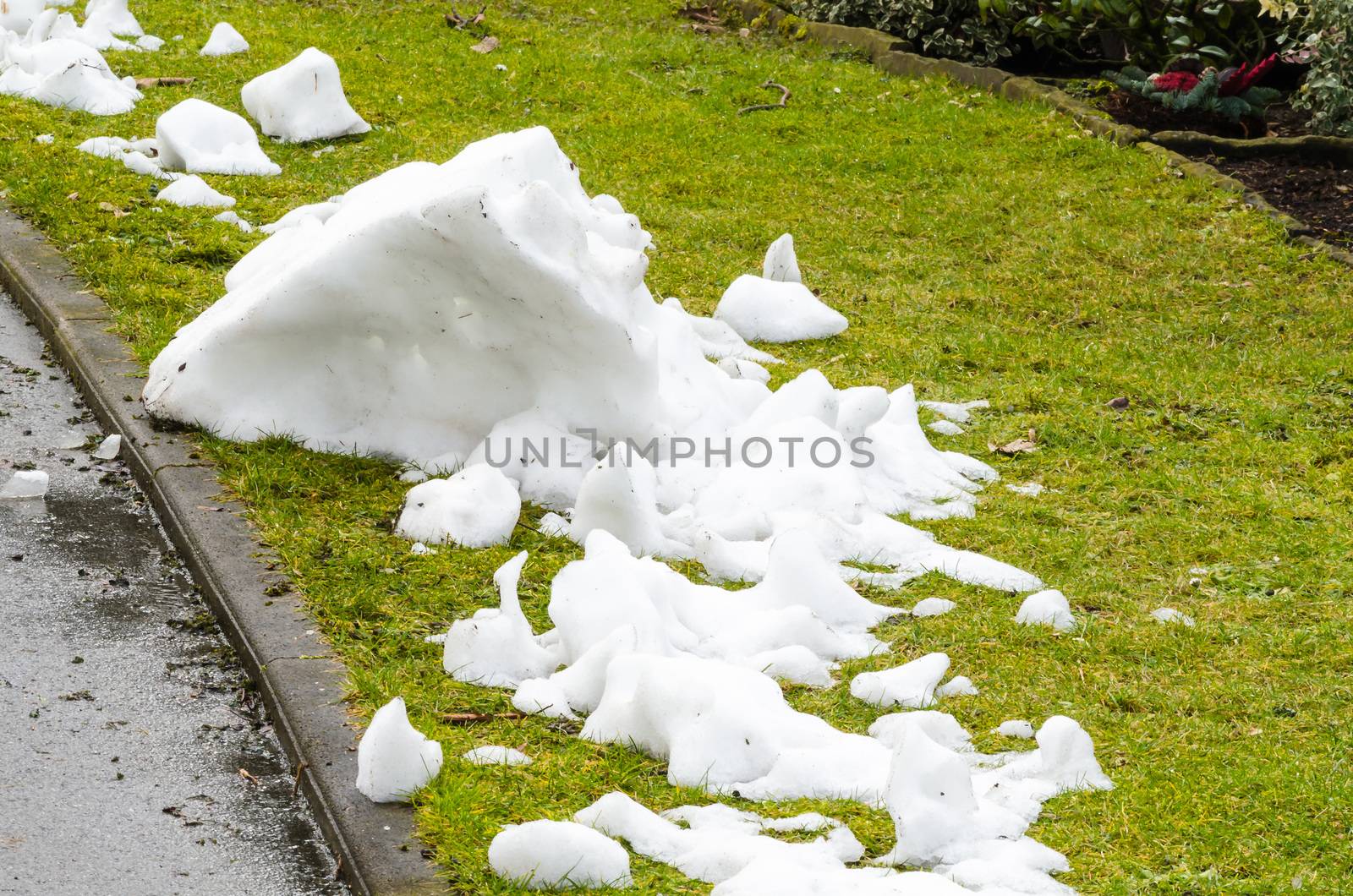 Beginning of the spring, small piles of snow, the last snow.