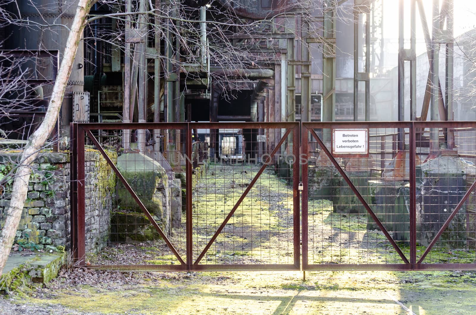 Exterior of the entrance of an old factory building.
