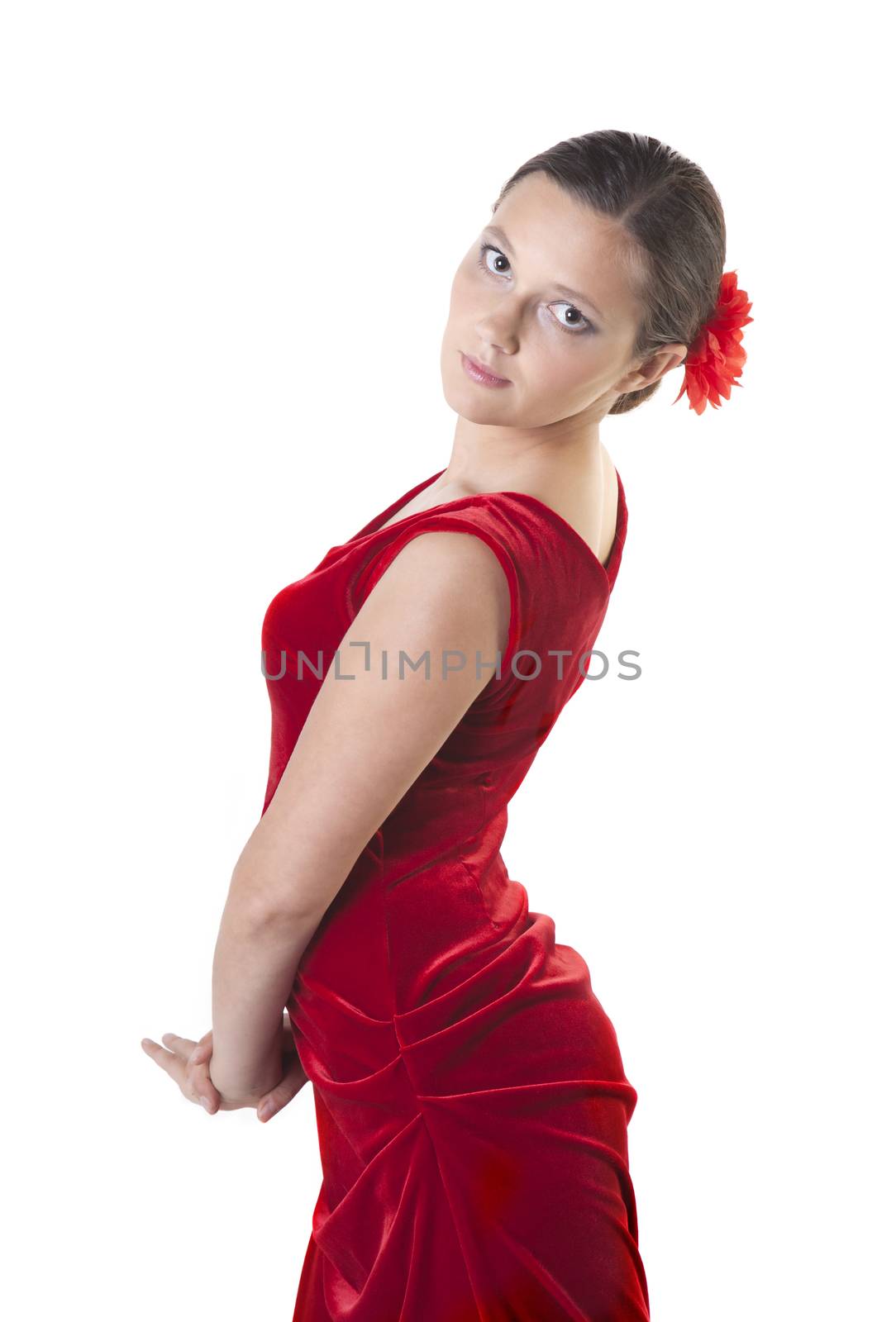 Dancer woman in a red dress isolated over white