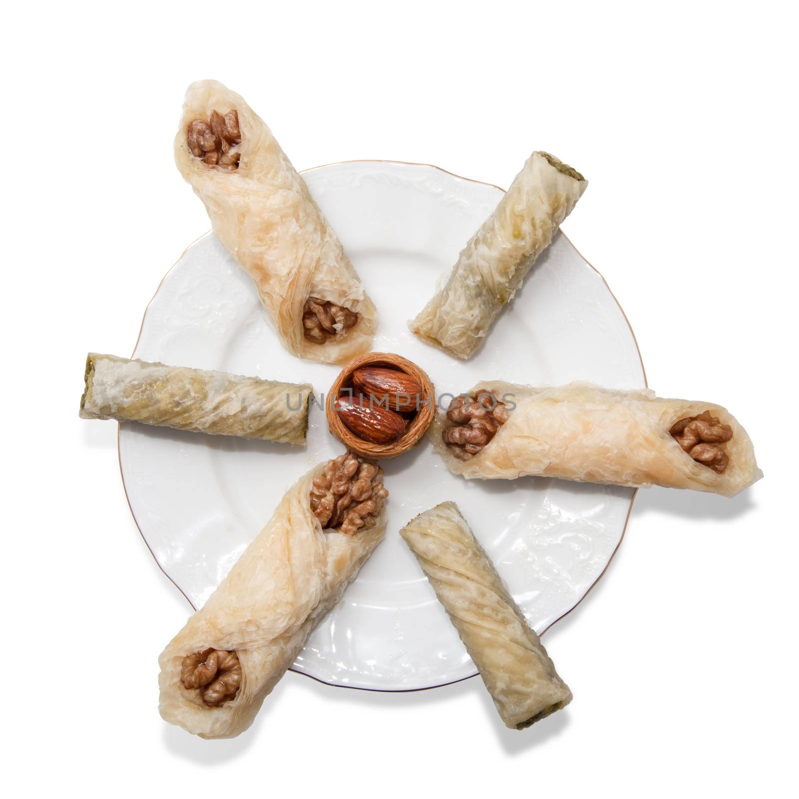 Plate with turkish baklava isolated over white background