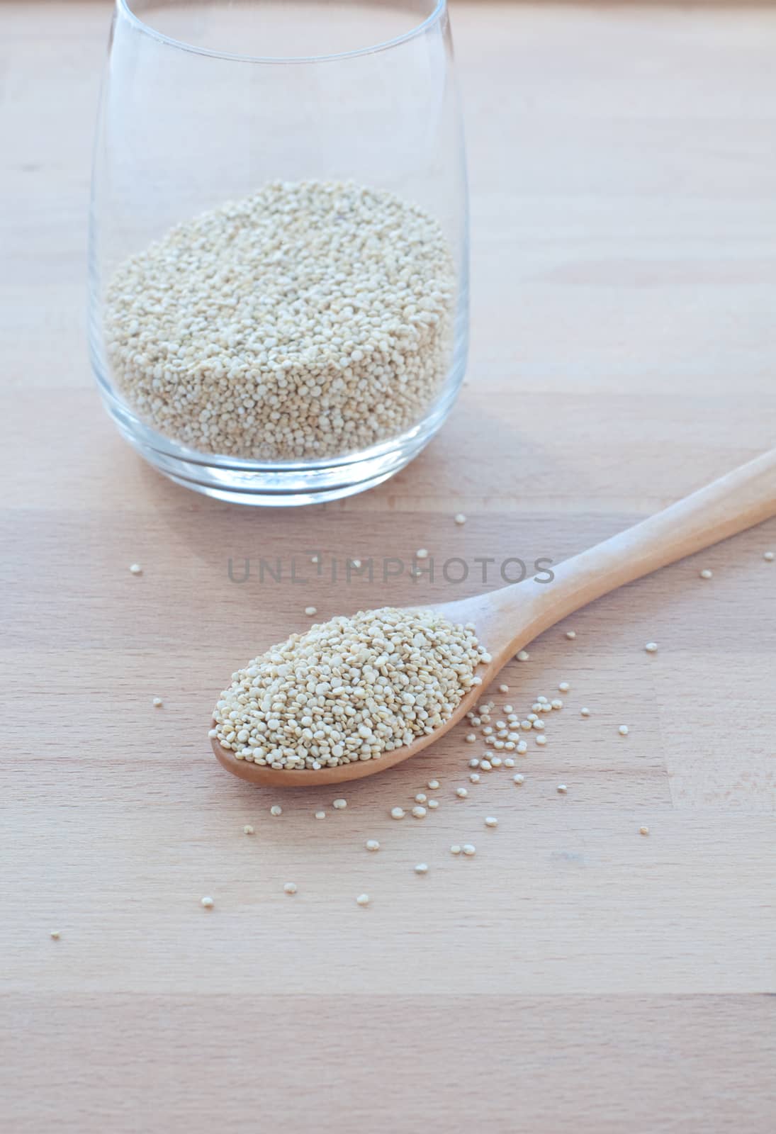 Filling a glass of quinoa grain from the Andes