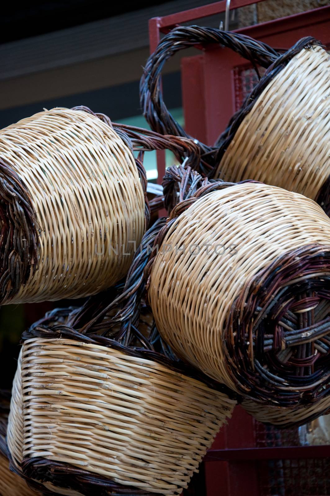 Group of handmade baskets straw attached to the door