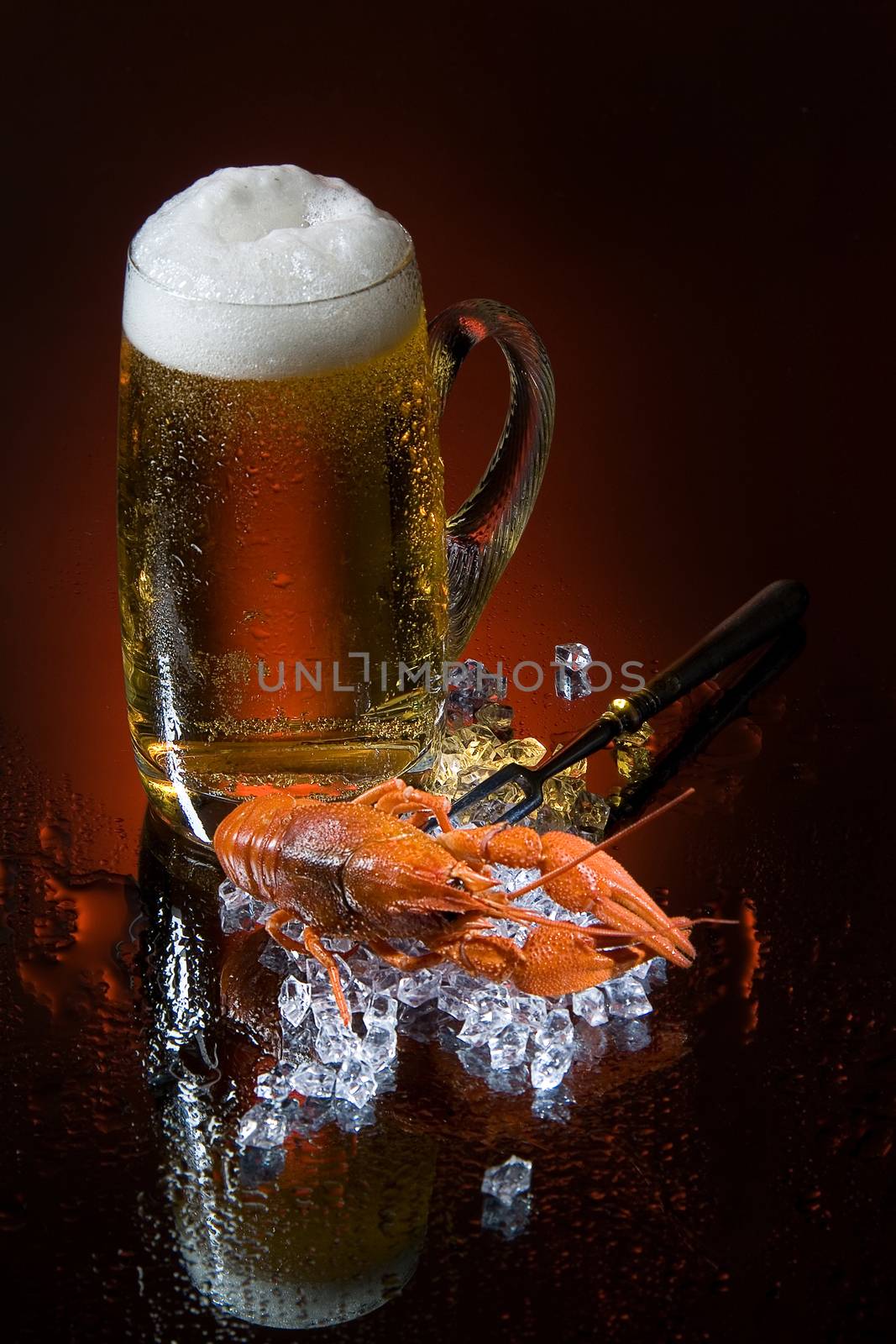 Mug of beer and crawfish