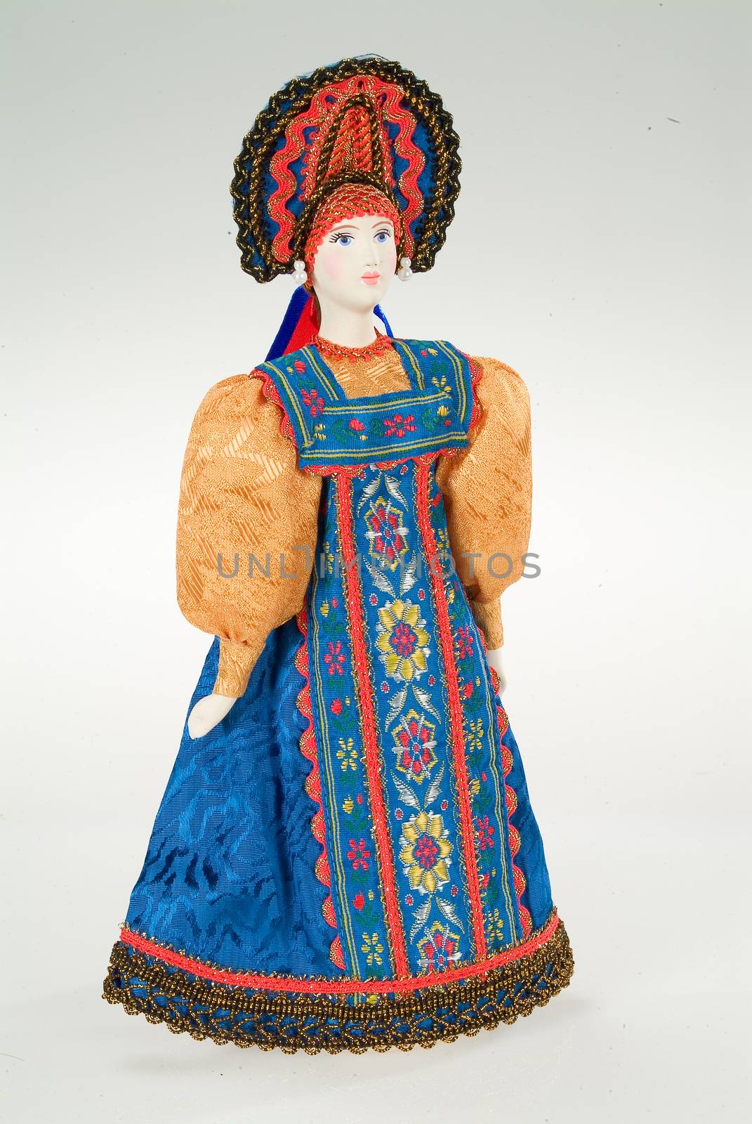 Old Russian traditional folk doll on a studio background