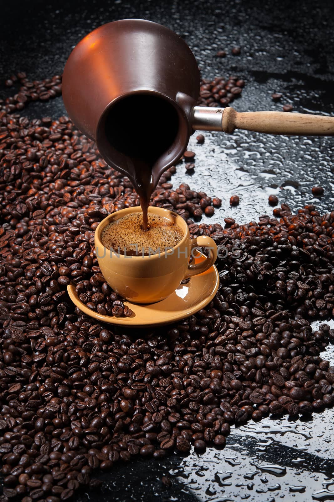 Coffee and beans on a glass studio background
