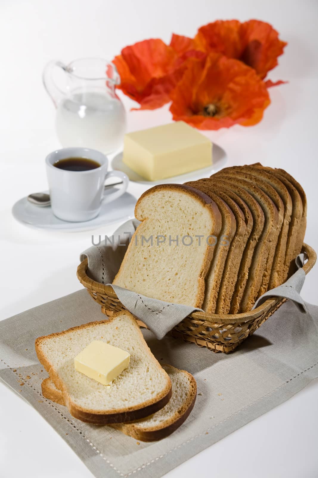 Bread, glass of milk and poppy