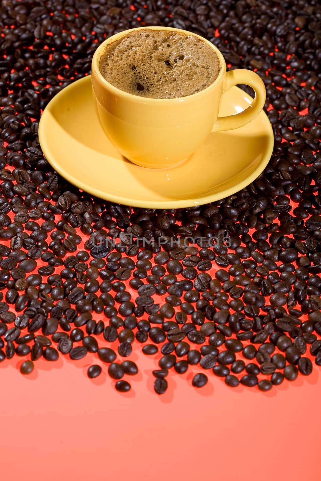 Cup of coffee and coffee beans